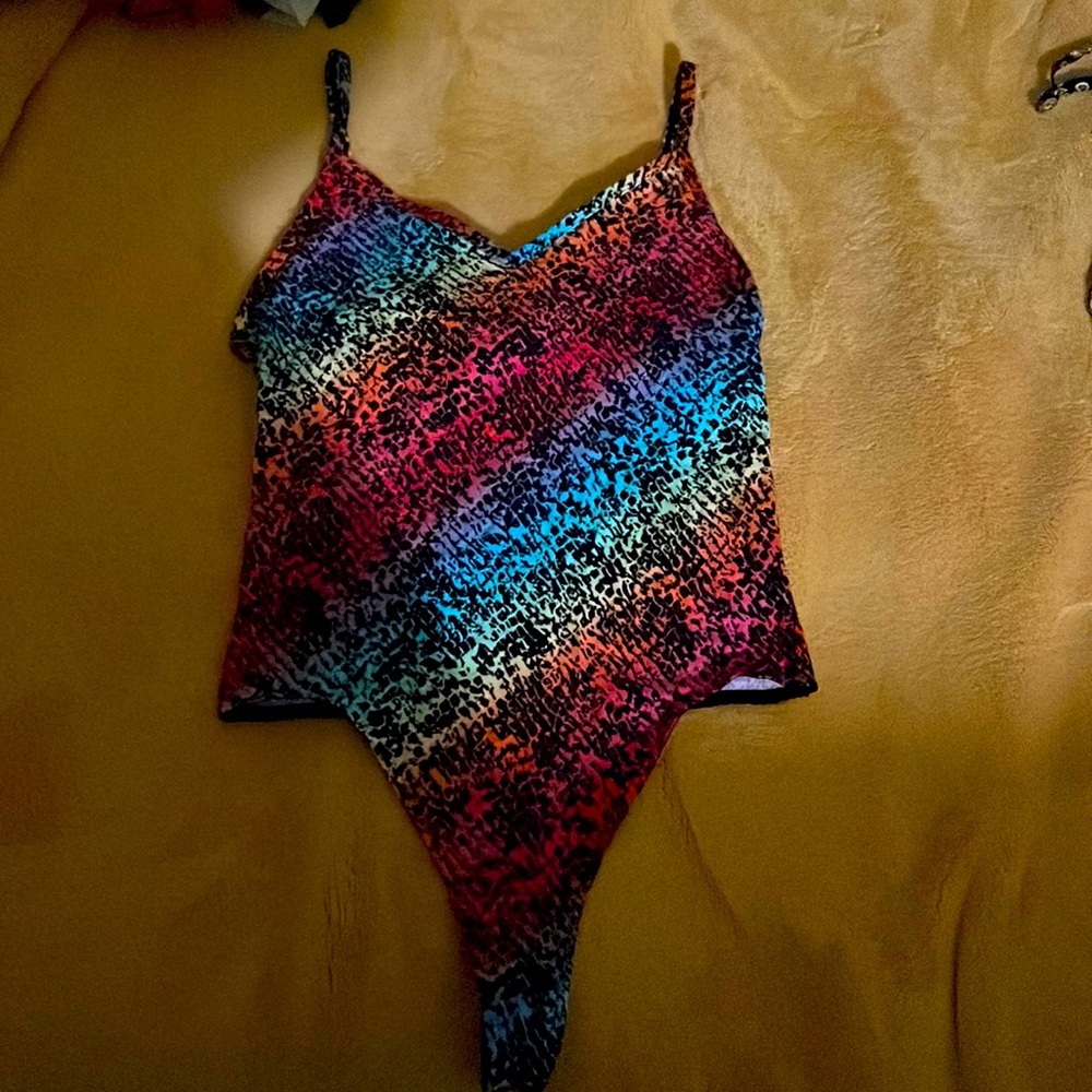 Pink, colorful bodysuit brand new.